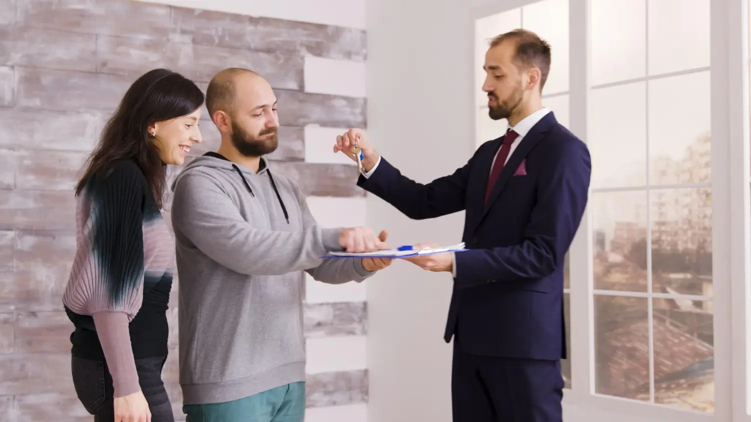 best property dealers giving key to customer in islamabad
